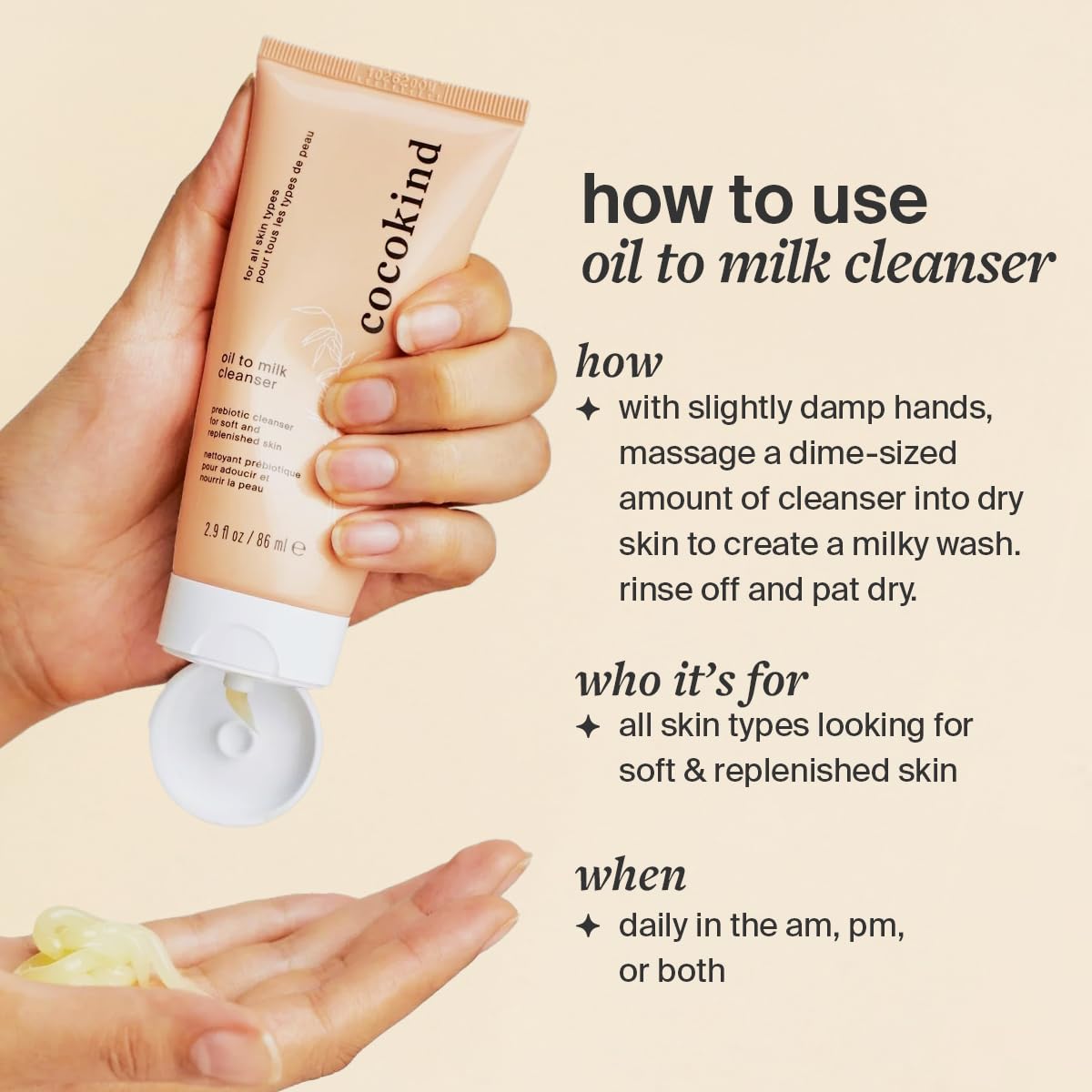 Cocokind Oil to Milk cleanser in hand massaging onto dry skin.