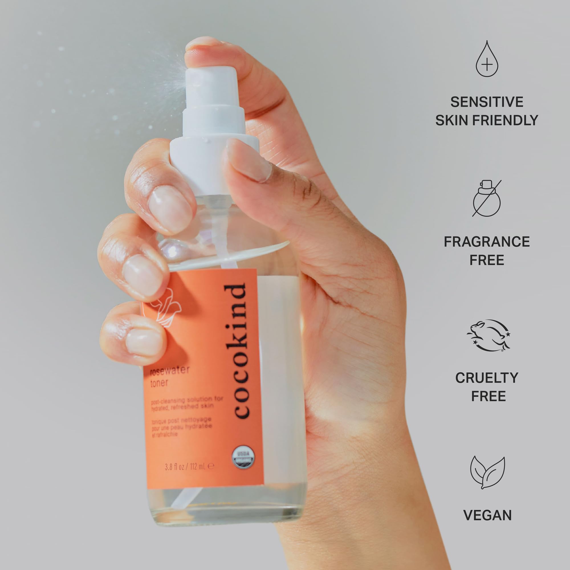 Cocokind Rosewater Toner on scalp for soothing hydration between washes