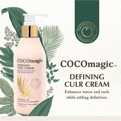 Cocomagic Defining Curl Cream application hand highlights detangling and curl definition.