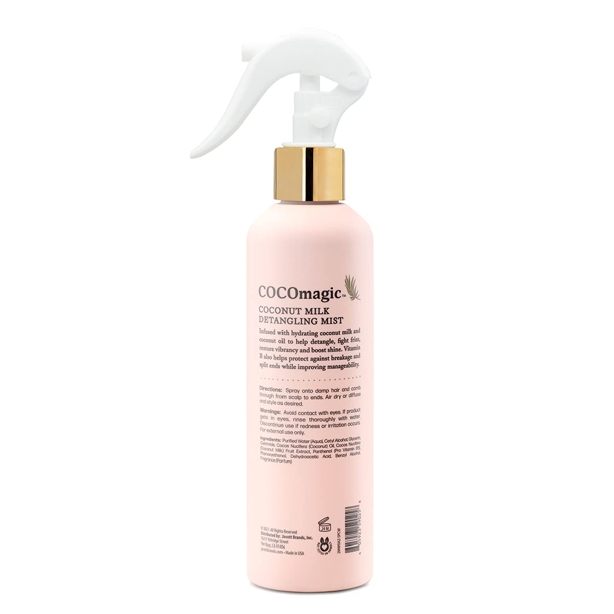 Cocomagic detangling mist applied on hair demonstrating smooth detangling