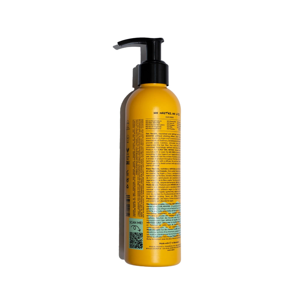 COCUNAT Curl Booster Gel on damp strands delivering defined spiral curls