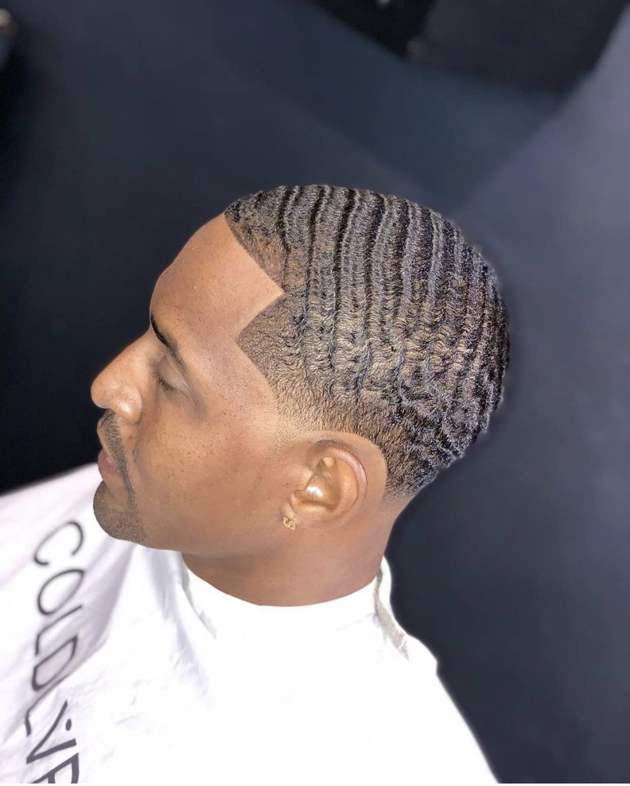 ColdLabel Wolfin Pomade on hair showing natural shine and healthy finish.