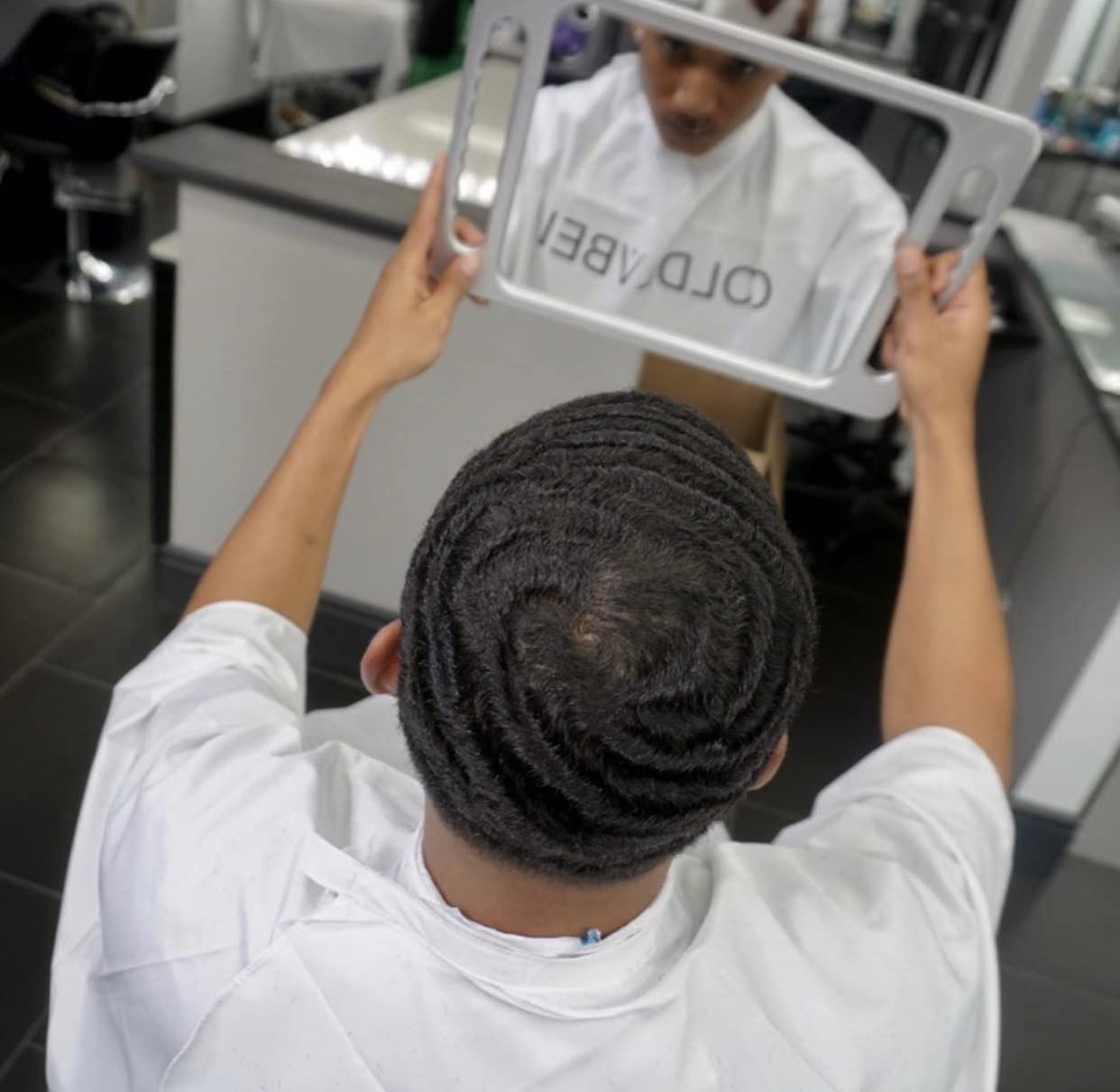 COLDLABEL Premium Wave Butter hair-texture close-up shows smooth, non-greasy finish.
