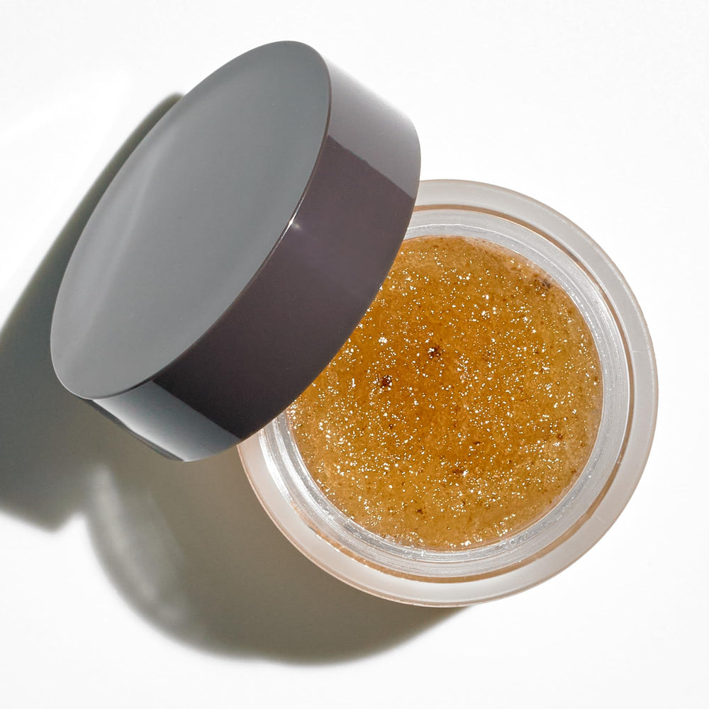 Colleen Rothschild Sugar Lip Scrub texture with spoon suggests nourishing routine.
