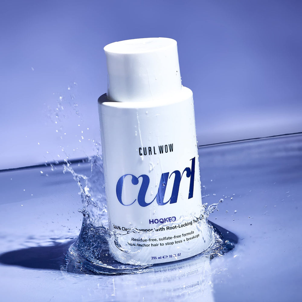 COLOR WOW Curl Wow Hooked bottle pour demonstrates easy, even lather for curls.