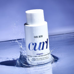 COLOR WOW Curl Wow Hooked bottle pour demonstrates easy, even lather for curls.