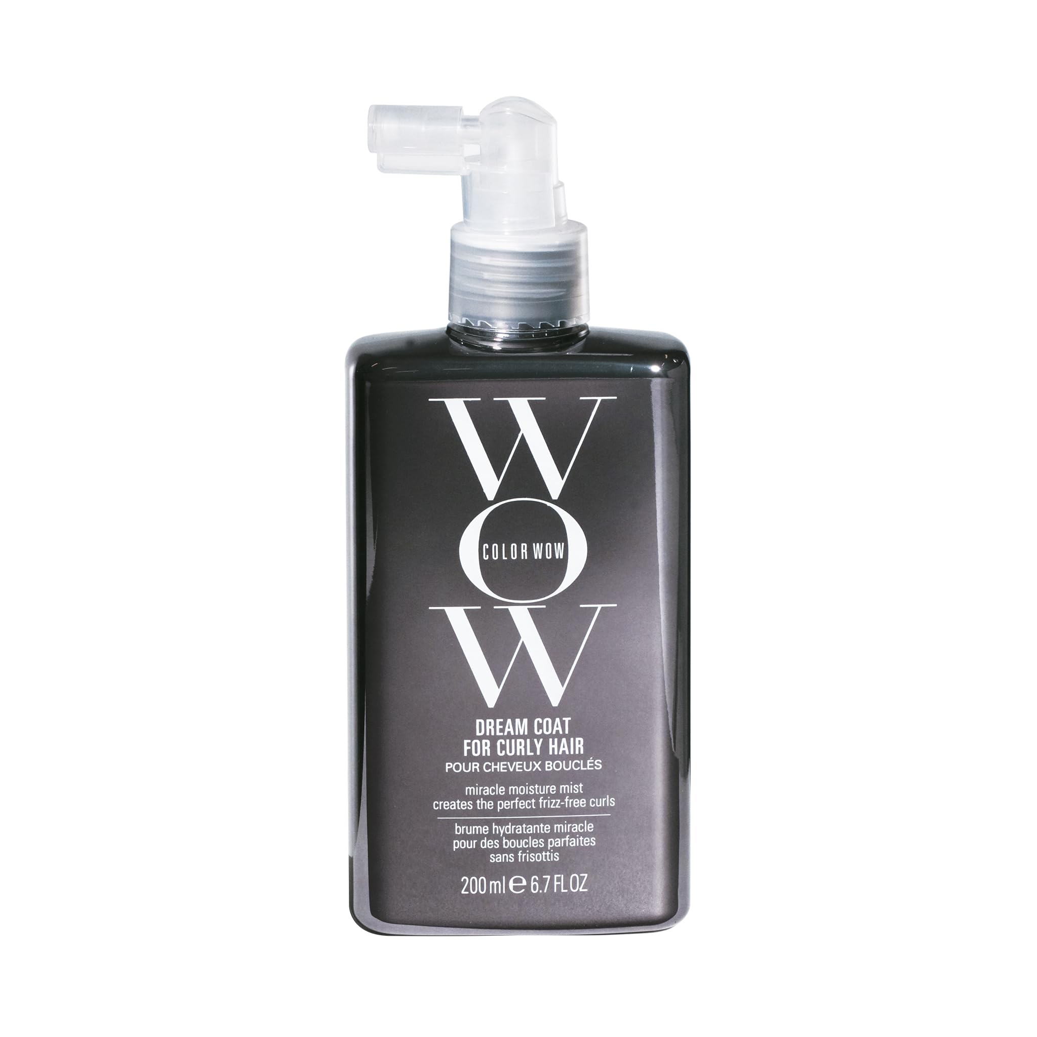 COLOR WOW Dream Coat curly hair bottle showing frizz-free, defined curls.
