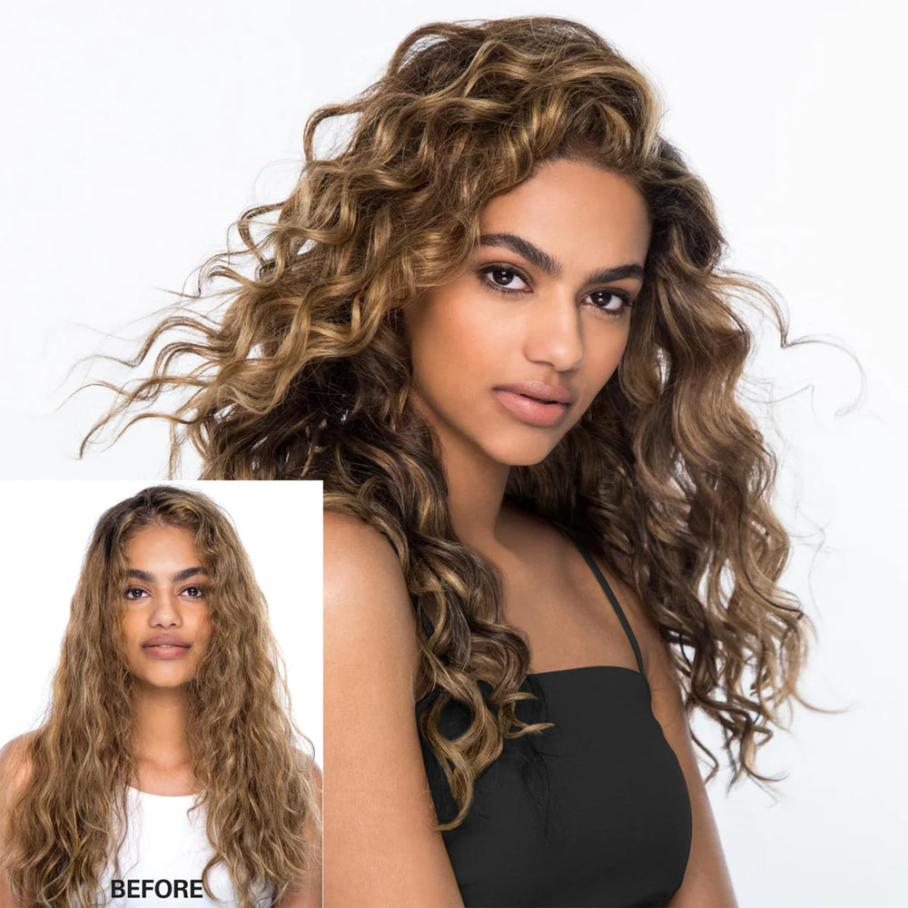 COLOR WOW Dream Coat Curly Bottle on vanity, quick lightweight styling to tame frizz.