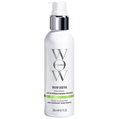 COLOR WOW Dream Cocktail bottle on bathroom shelf showing fortifying leave-in treatment