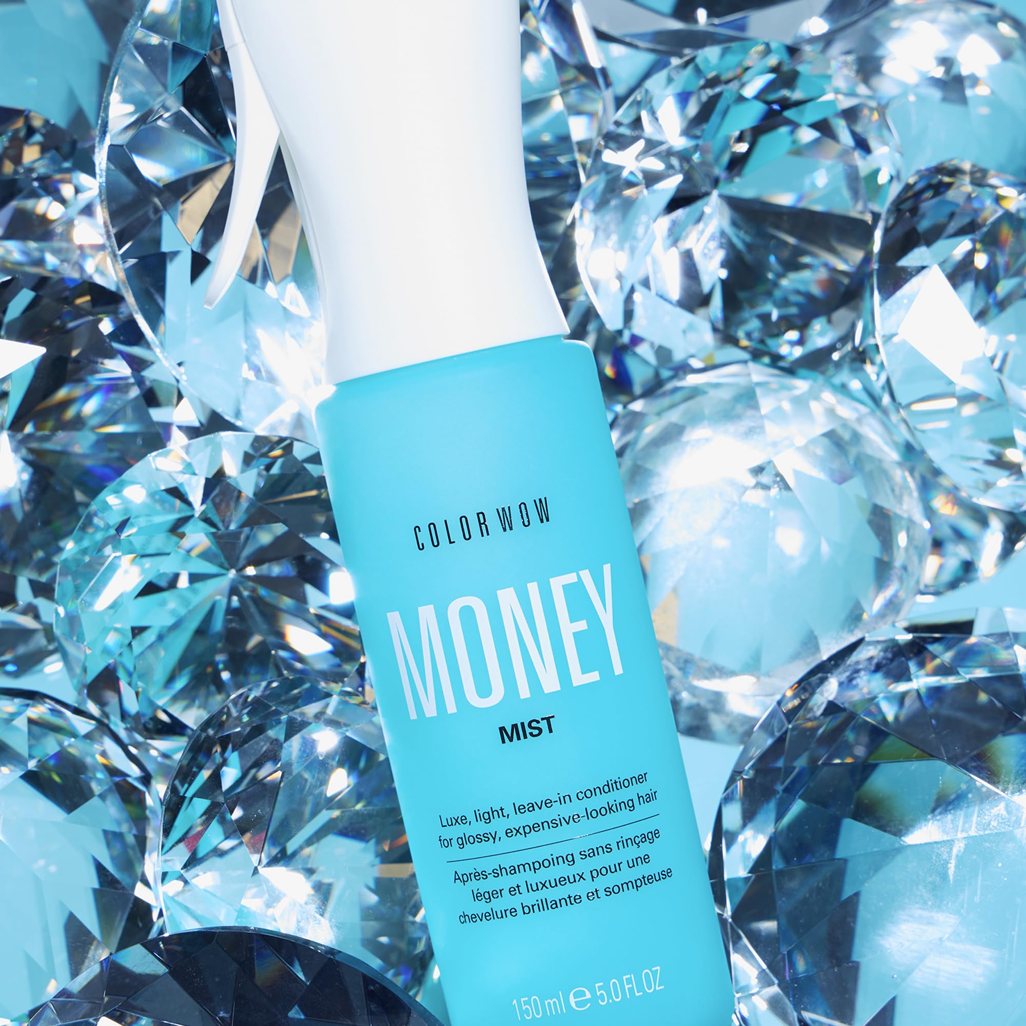 COLOR WOW Money Mist sprayer close-up highlighting easy detangling.
