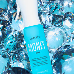 COLOR WOW Money Mist sprayer close-up highlighting easy detangling.