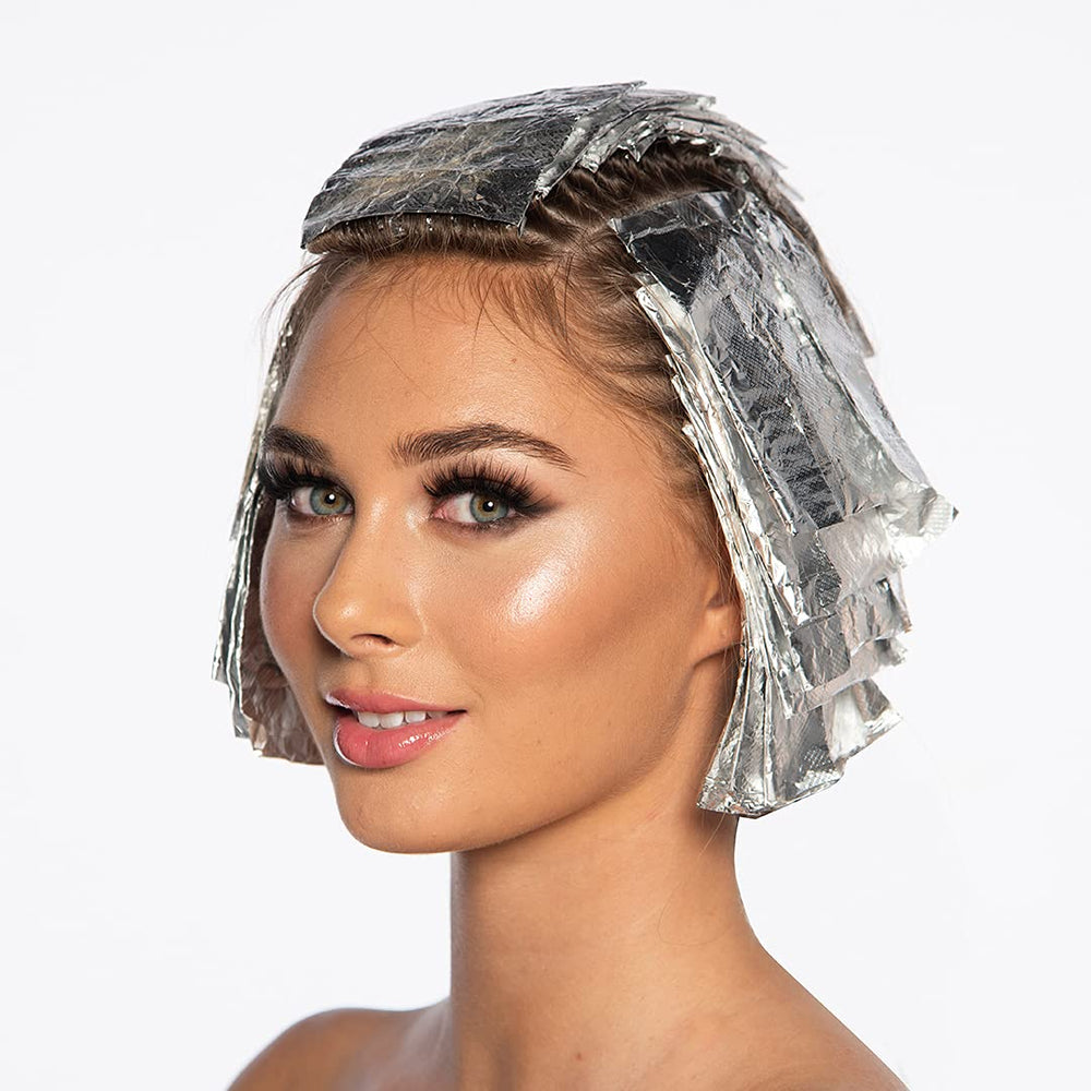 Colortrak hair coloring foil aids precise application while highlighting.