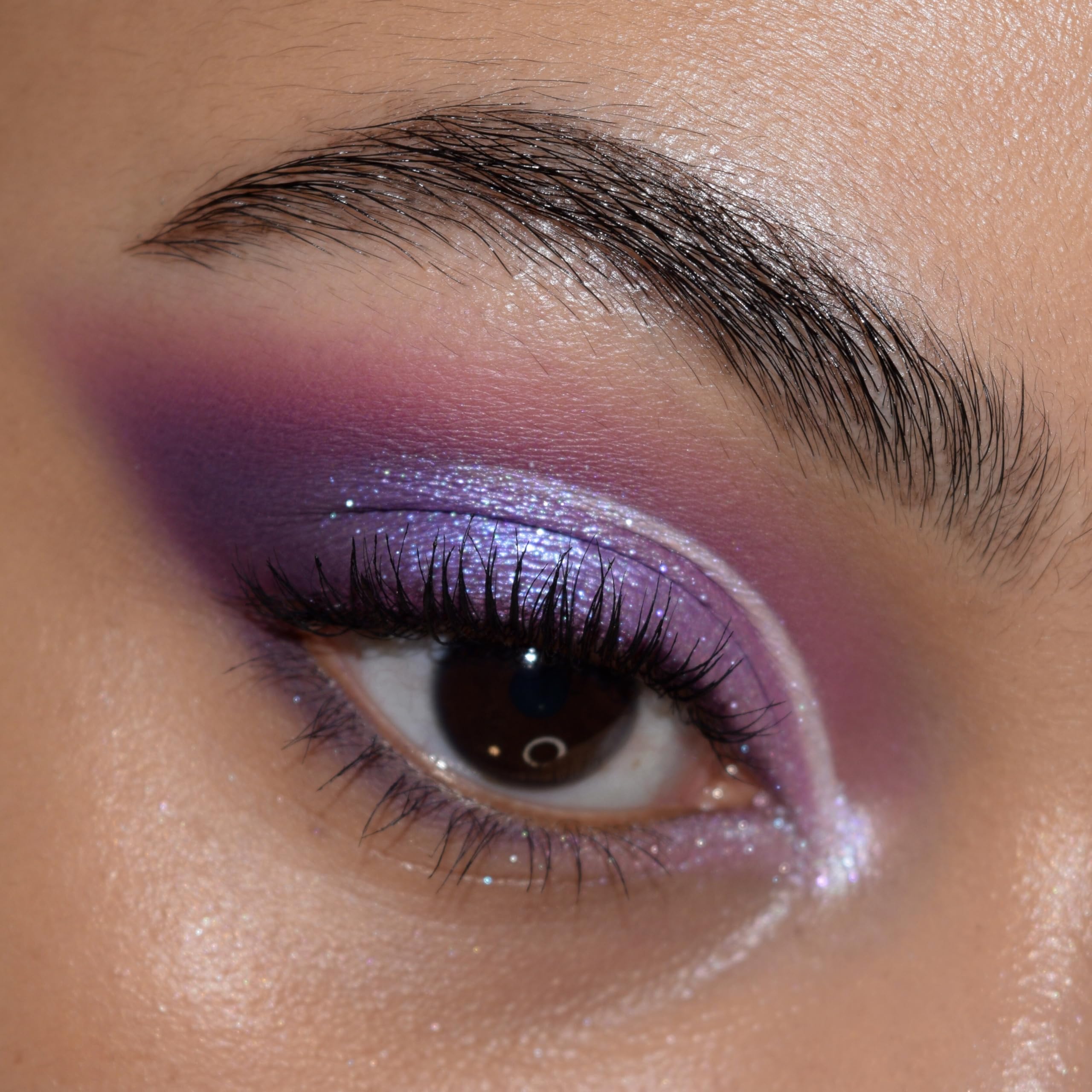 ColourPop All Amethyst palette application brushes image for best color payoff.