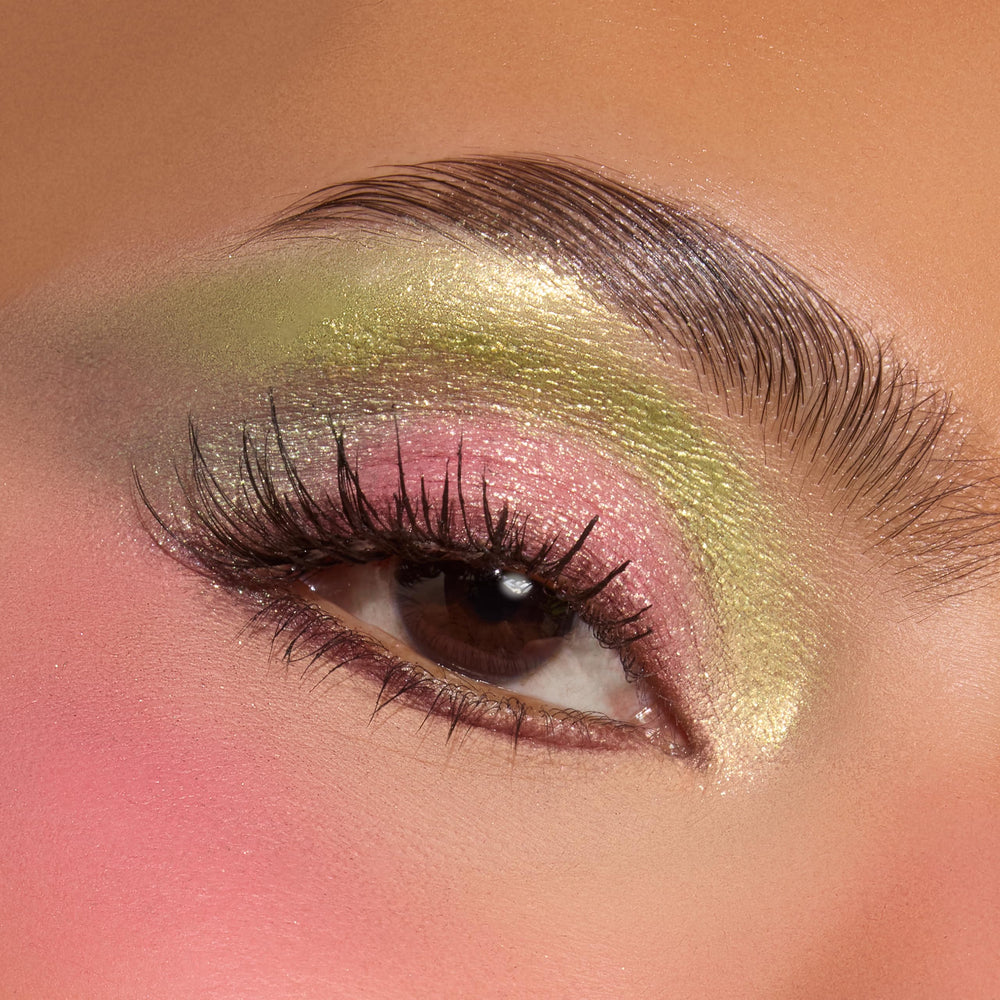 ColourPop Grinch palette brush strokes illustrate precise liner and soft lid blending.