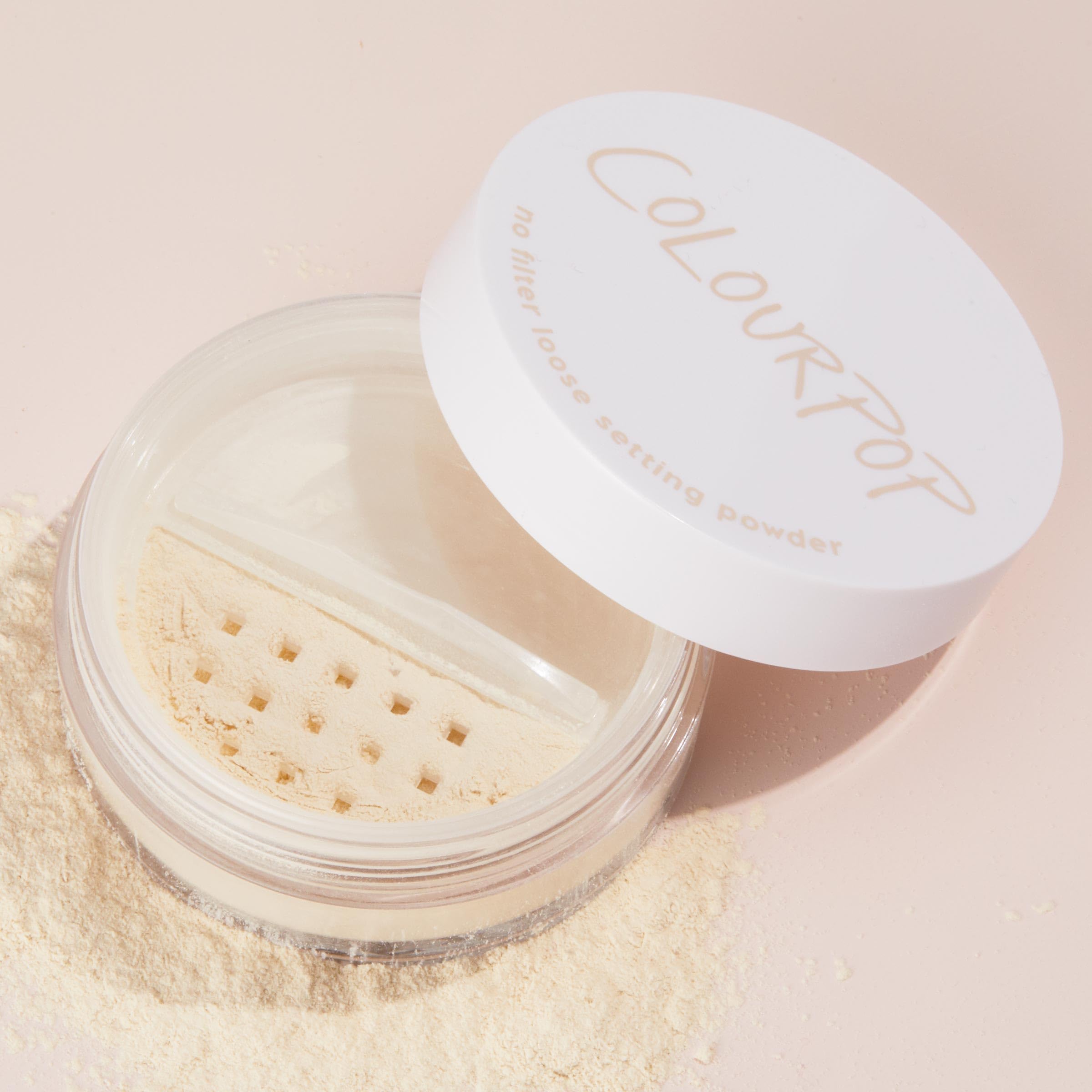 ColourPop No Filter Loose Setting Powder ultra-fine texture seen on skin for crease-free wear.