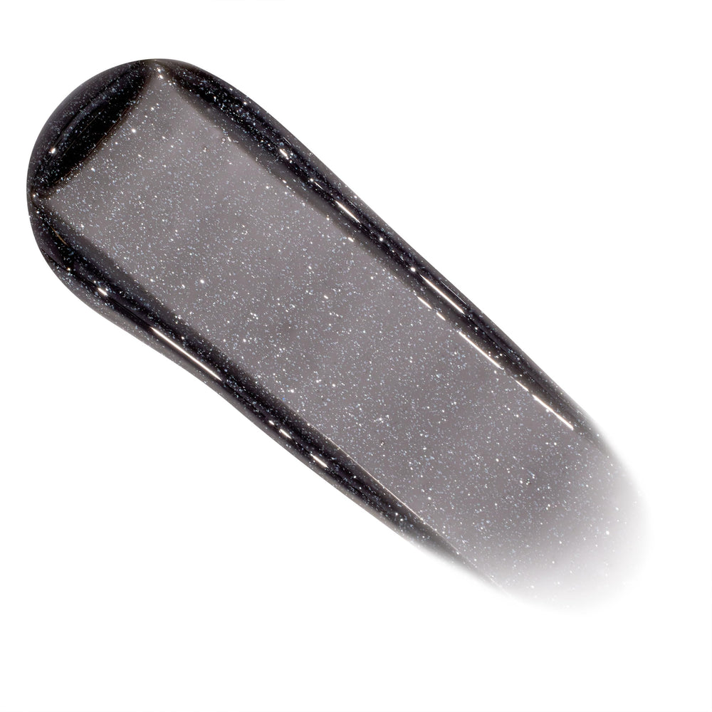 ColourPop Twilight Lux Lip Oil on lips delivers sheer color with non-sticky shine.