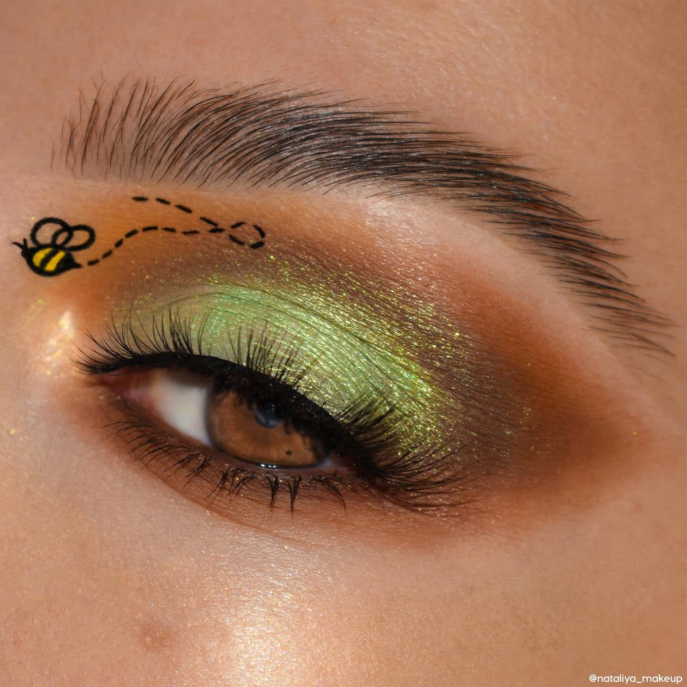 ColourPop Winnie the Pooh Sweet As Can Bee metallic shade swatch shows luminous finish.