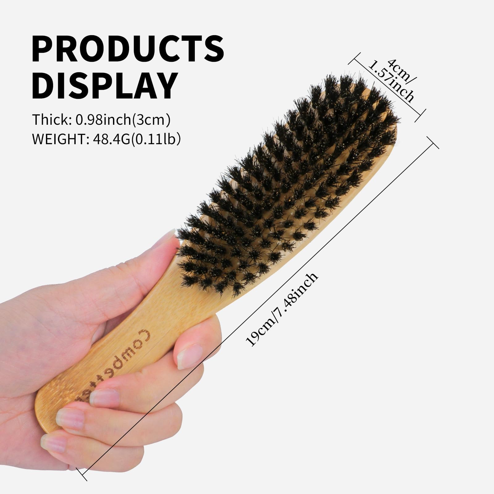 Combetter wooden-handle brush taming flyaways and adding natural shine.