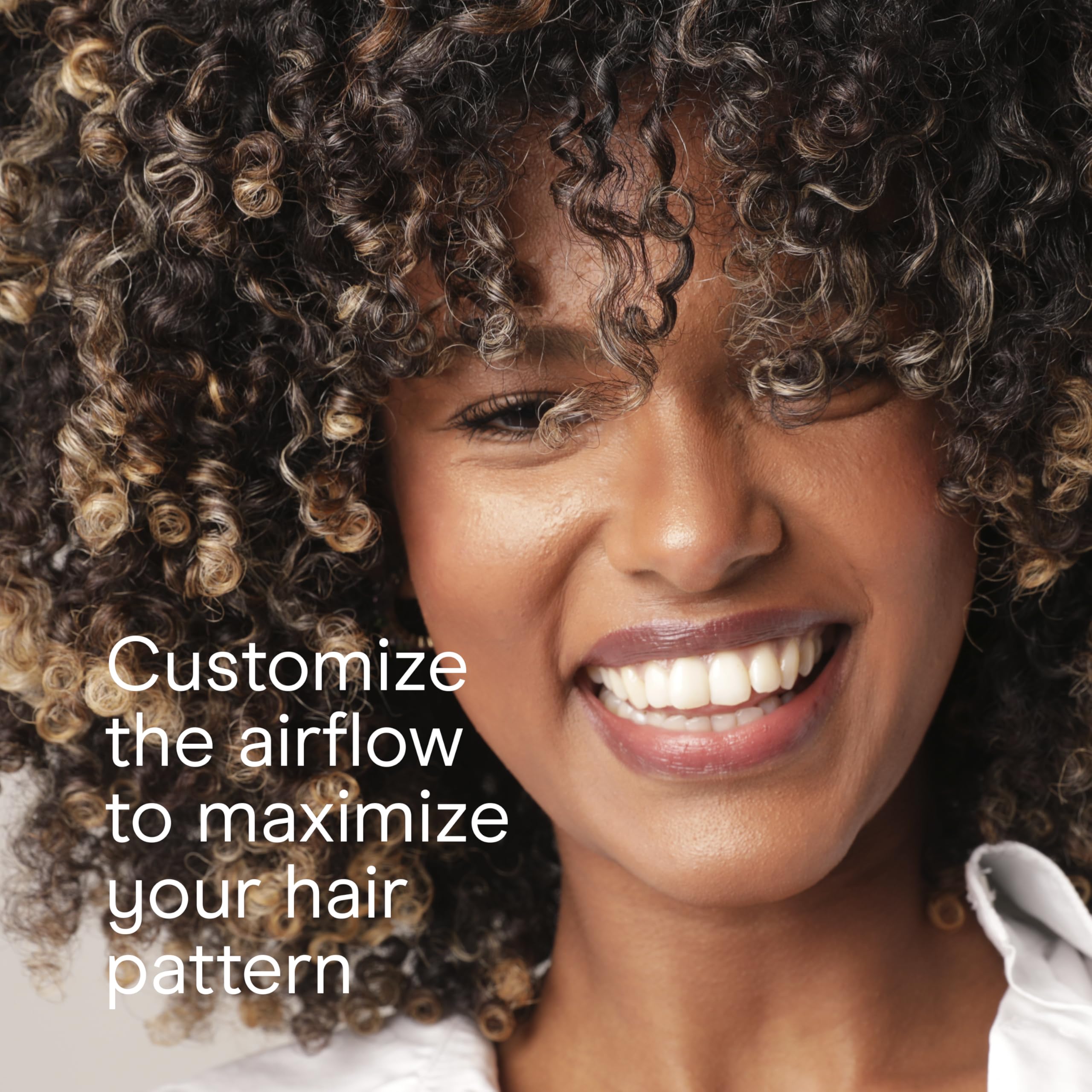 Conair InfinitiPRO true cold shot to lock curls and set waves.
