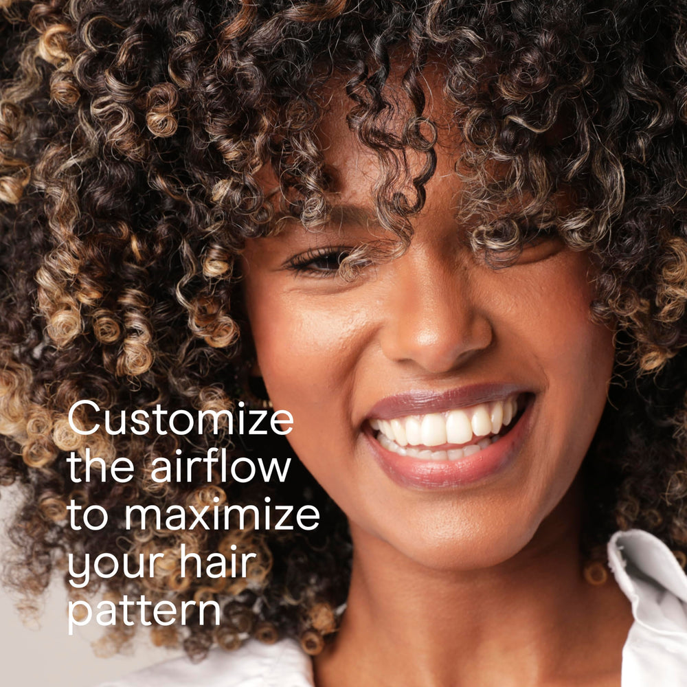 Conair InfinitiPRO true cold shot to lock curls and set waves.