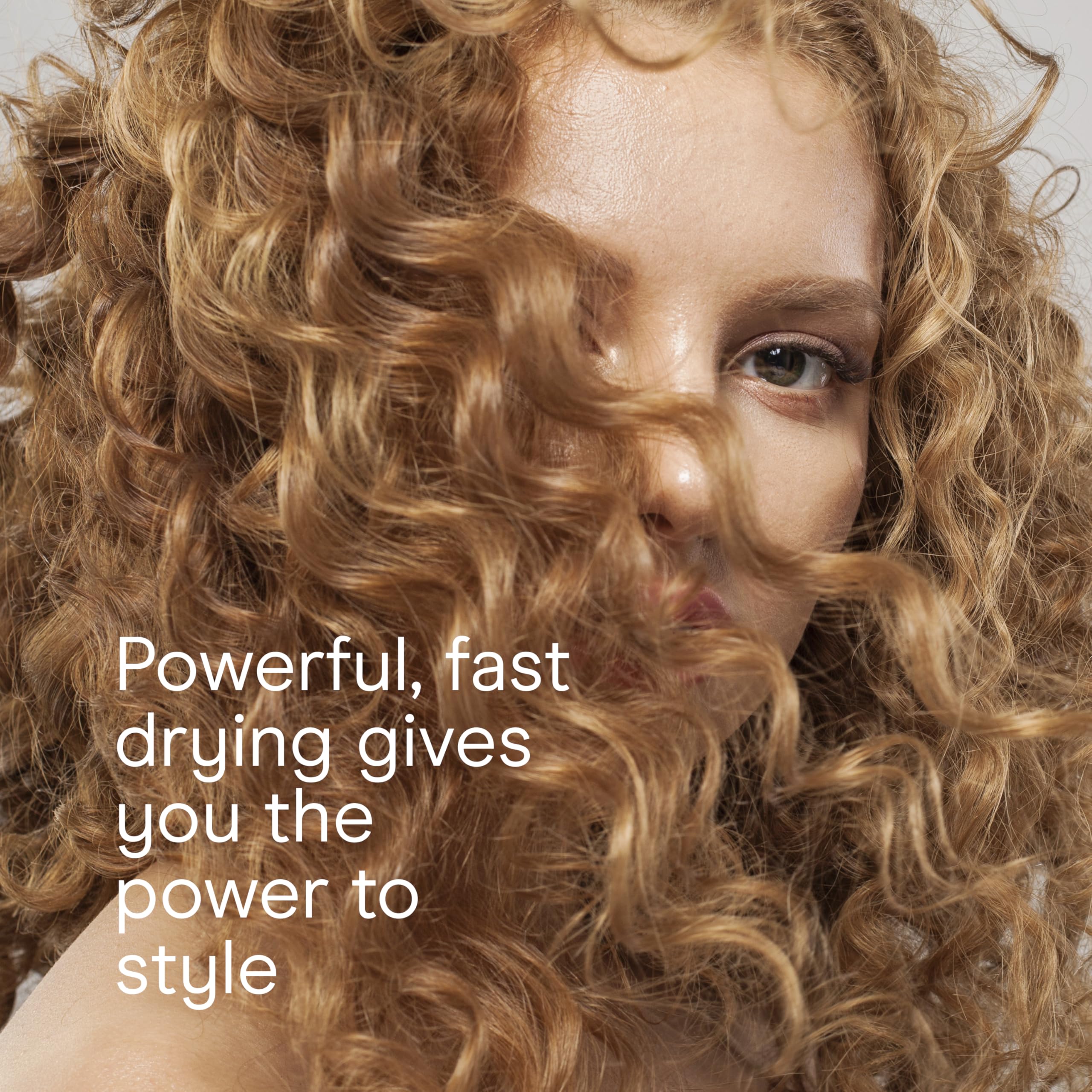 Conair InfinitiPRO ionic technology reducing frizz and boosting shine on textured hair.