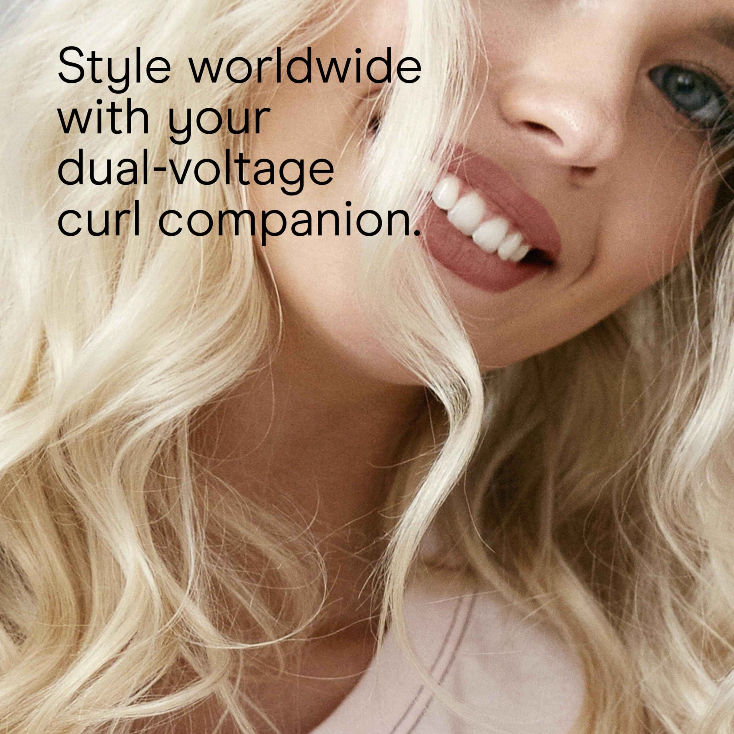 Conair Instant Heat curling iron 25-heat settings dial highlights versatile temperature control.