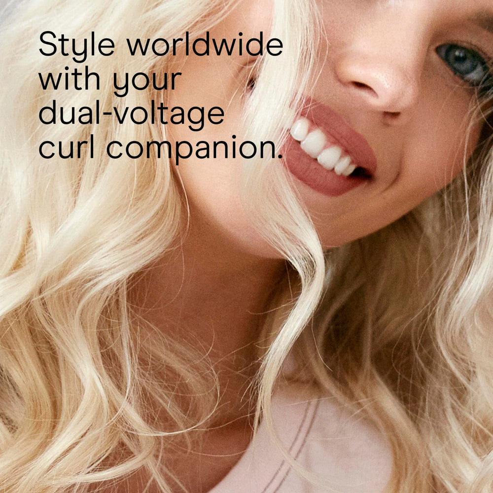 Conair Instant Heat curling iron 25-heat settings dial highlights versatile temperature control.