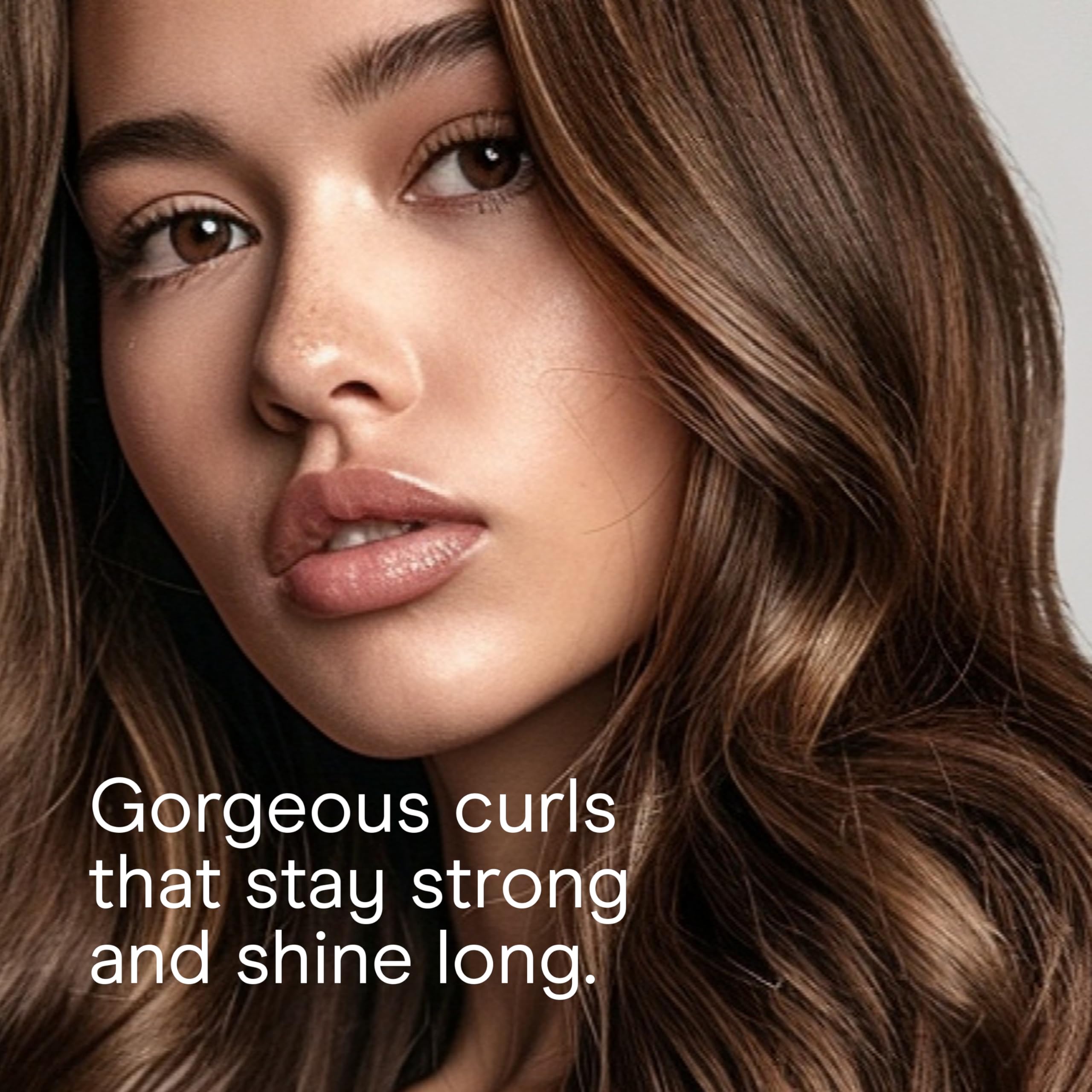 Conair Instant Heat curling iron cool-tip closeup emphasizes safe handling.