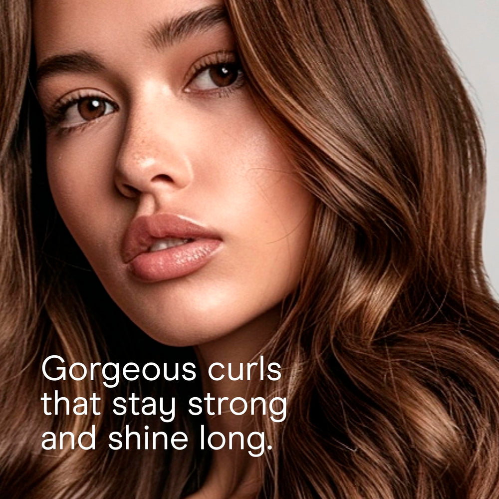 Conair Instant Heat curling iron cool-tip closeup emphasizes safe handling.