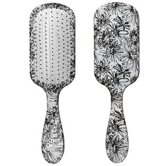 Conair Knot Dr detangler brush with a daisy print for smooth detangling on wet or dry hair