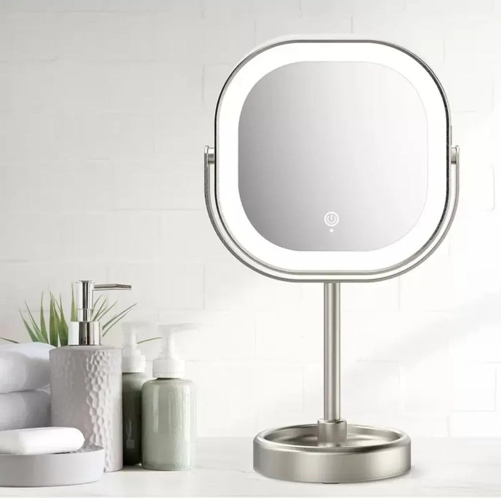 Conair rotating LED mirror with 10x magnification for precise brow shaping and lash work.