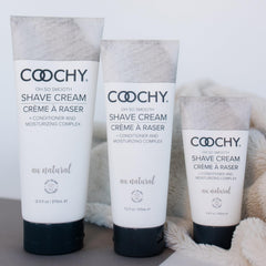 Coochy Shave Cream with jojoba oil close-up on skin.