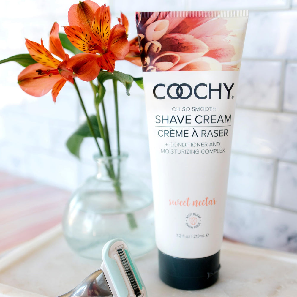 Coochy Shave Cream texture close-up shows creamy luster and glide