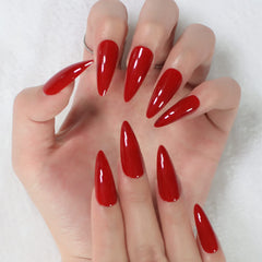 Coolnail glossy red stiletto nails catching light for high-shine finish