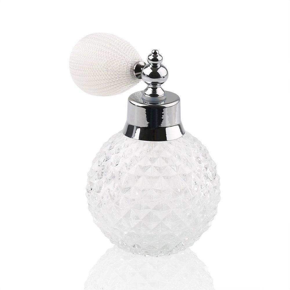 Coolrunner Crystal Art pineapple-pattern bottle closeup for stylish fragrance display.