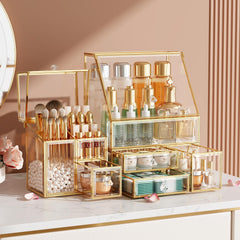 CoralHouse clear makeup organizer with gold frame on vanity for easy-access cosmetics.