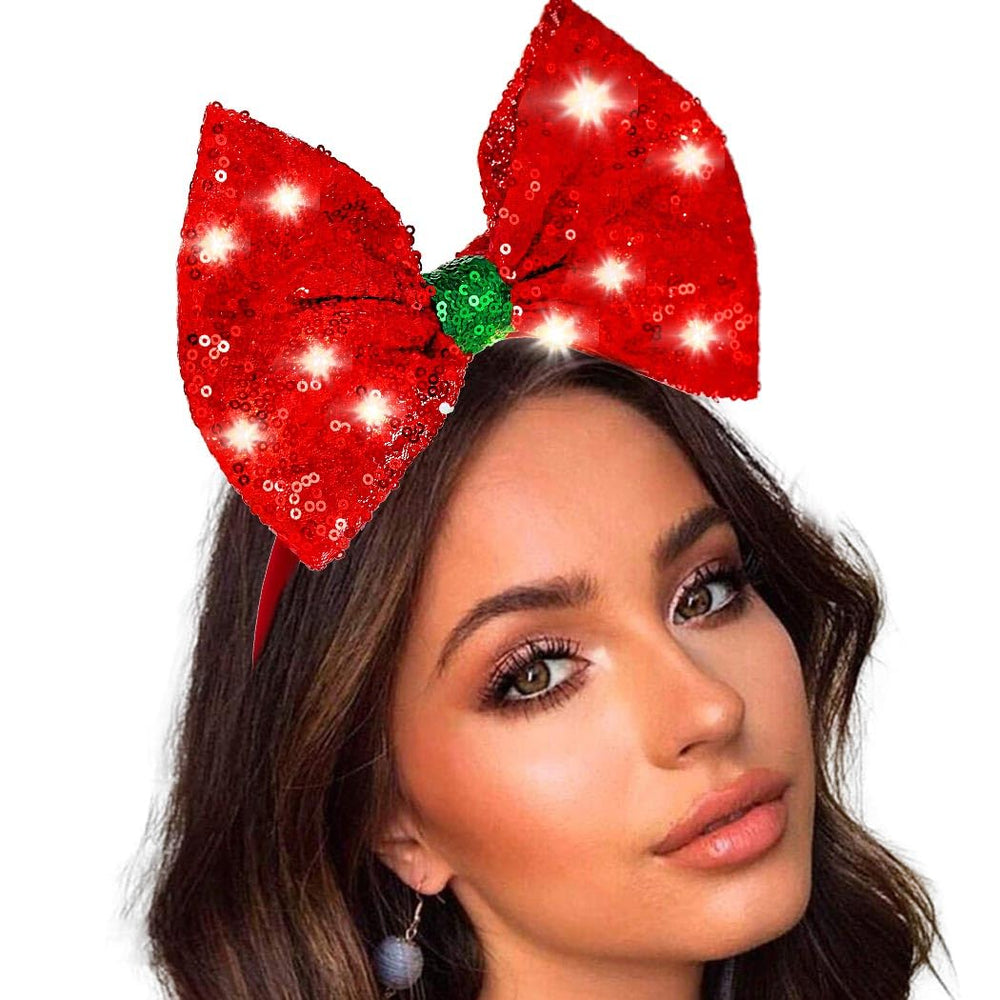 Coridy light up headband with red bow adds festive sparkle for parties.