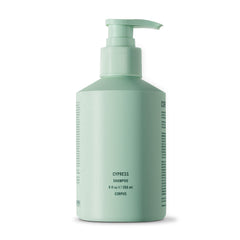 Corpus Cypress Shampoo bottle front shows premium plant-based formula for daily cleansing and nourishment for all hair types.