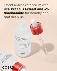 COSRX AC Collection serum dropper close-up showing quick absorption on skin