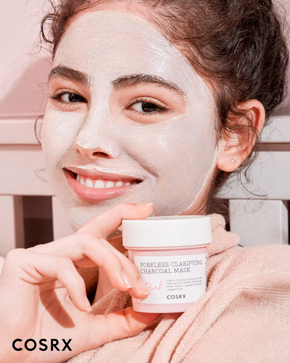 COSRX Pink Pore Clarifying Charcoal Mask spreads evenly for a soothing self-care moment.