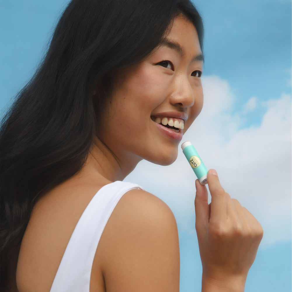 CoTZ Lip Spf 45 closeup emphasizes silky texture for lip comfort.