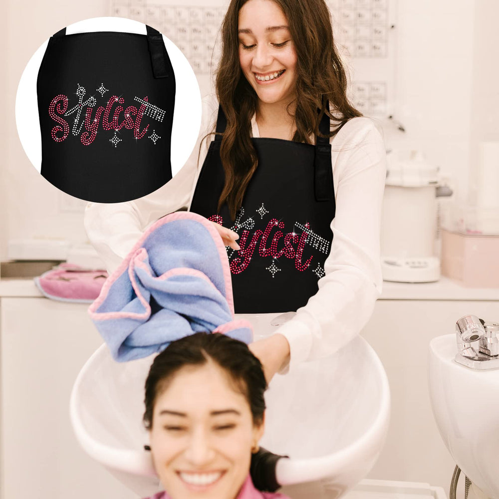 Coume rose-red rhinestone detail on waterproof apron for daily salon use.