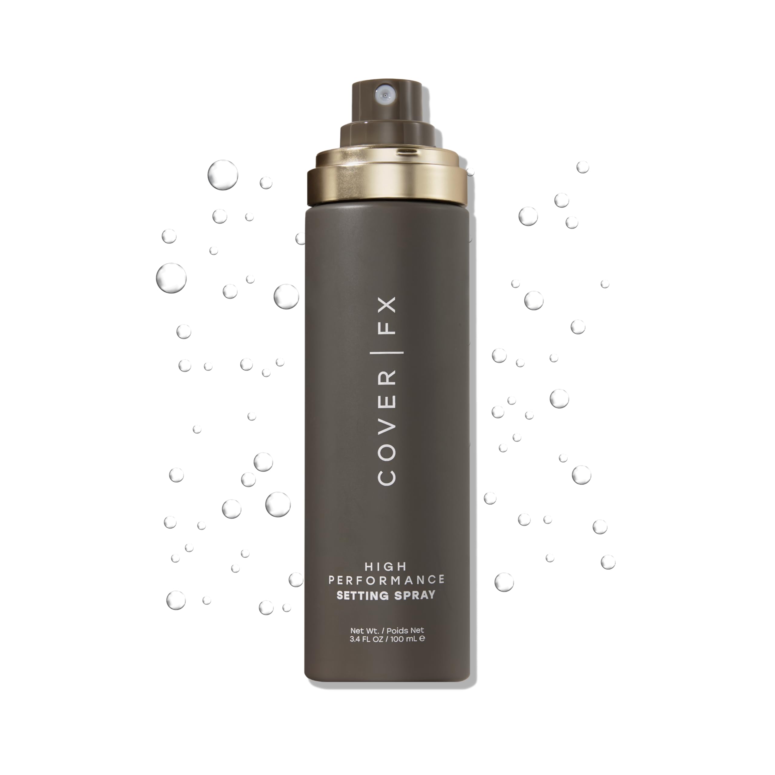 Cover FX setting spray bottle closeup demonstrates all-day makeup hold.