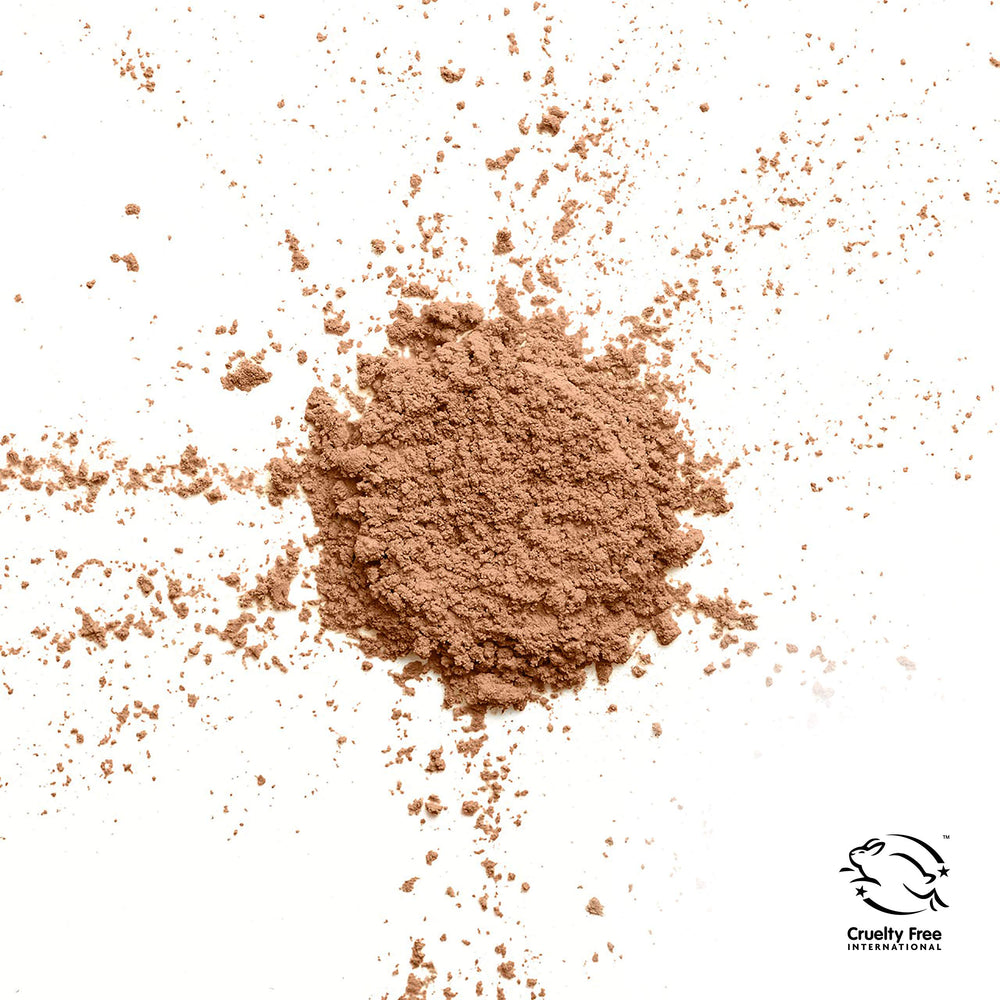 CoverGirl TruBlend loose mineral powder Tan airbrushed finish with minimal creasing.