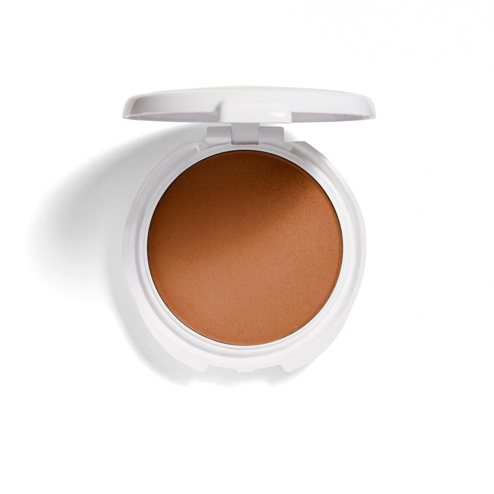 CoverGirl truBLEND translucent sable swatch highlighting skin-brightening minerals for balanced tone.