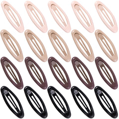 Cptots oval snap clip in black secures bangs for all-day style.