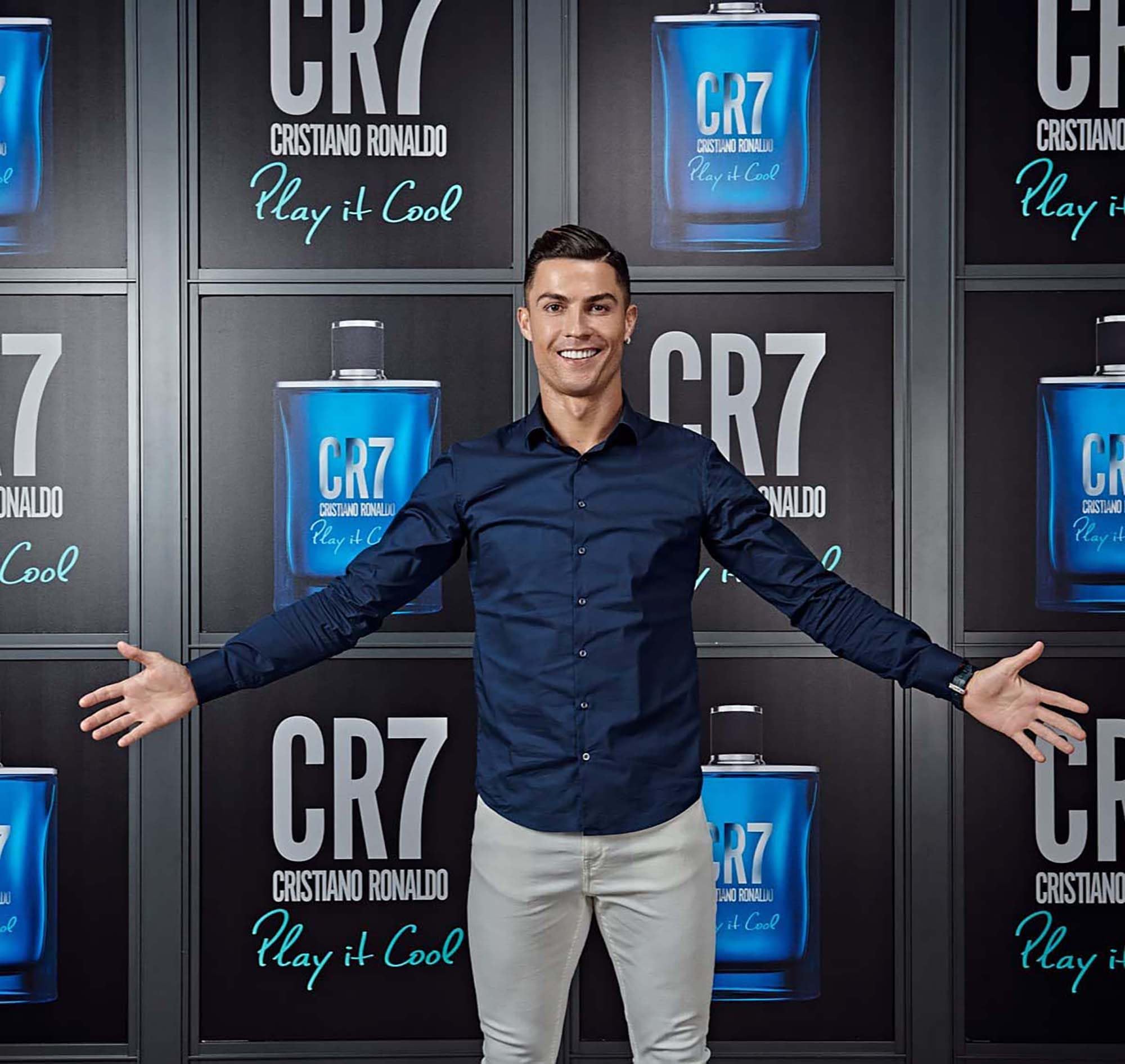 CR7 Play It Cool bottle design showcases iconic blue tones and branding.