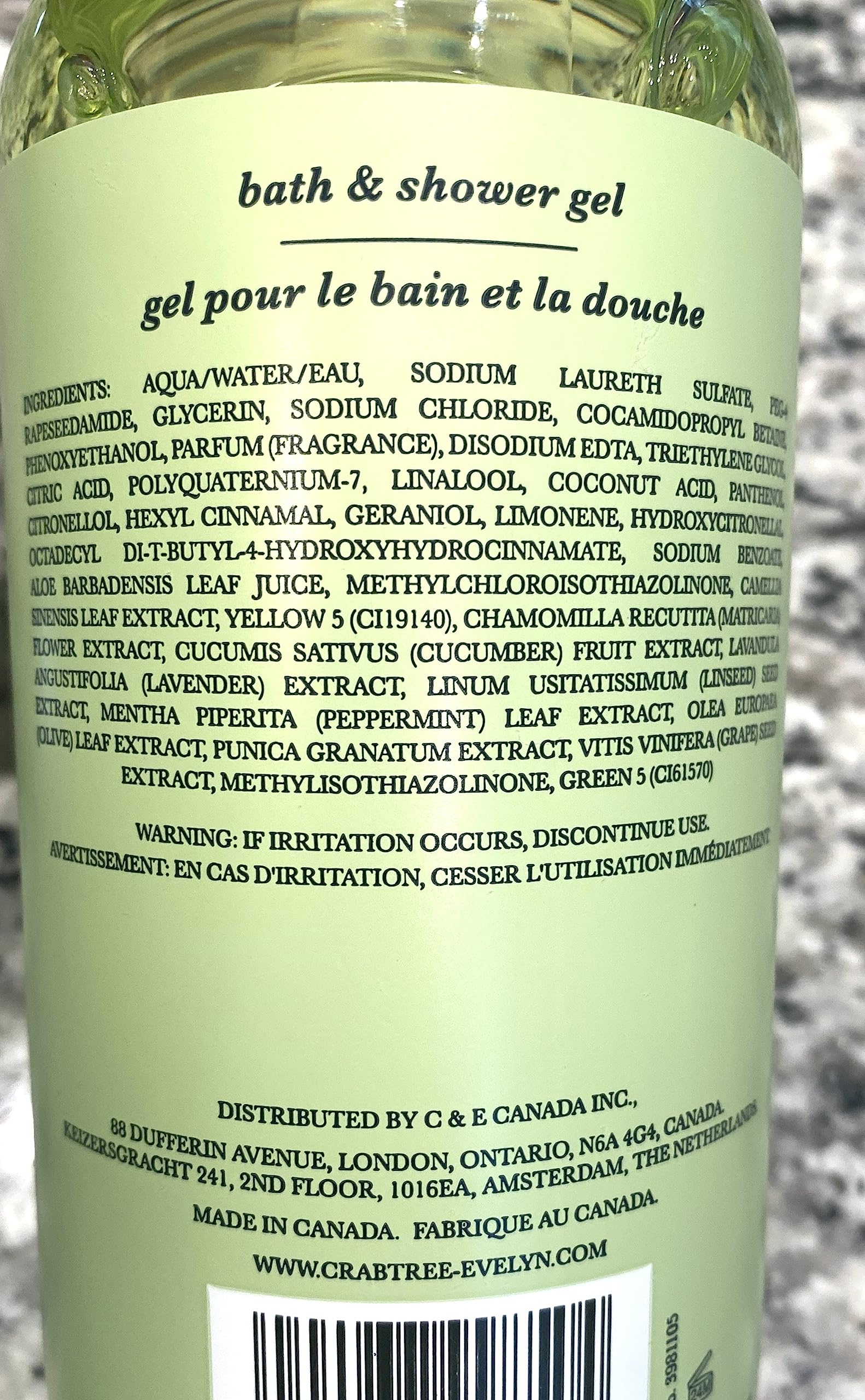 Crabtree & Evelyn Lily label closeup suggests green floral scent for a refreshing shower experience.