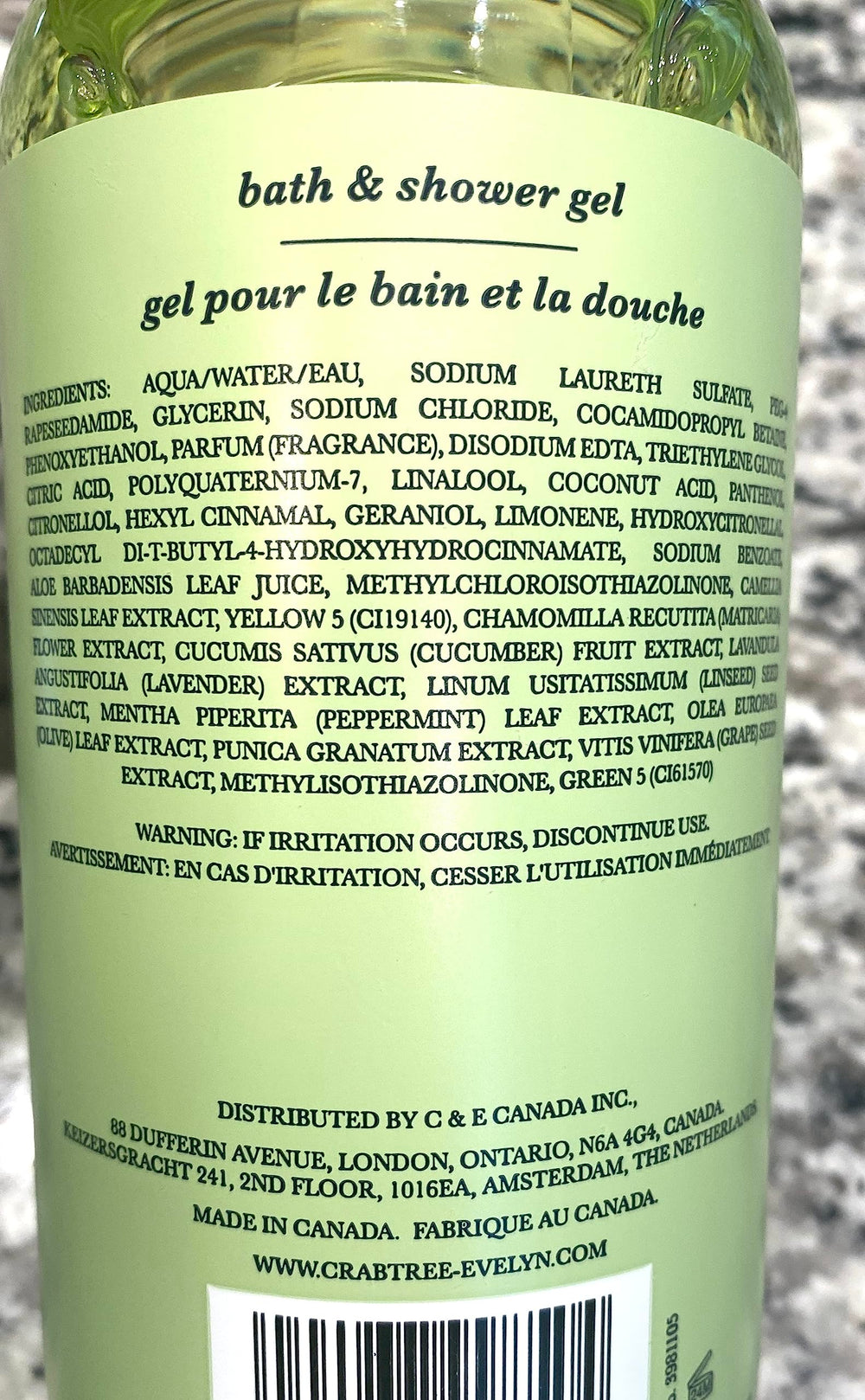 Crabtree & Evelyn Lily label closeup suggests green floral scent for a refreshing shower experience.
