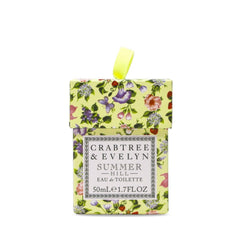 Crabtree & Evelyn Summer Hill fruit-grass scene, suggesting a breezy orchard-inspired scent experience.